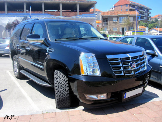 Black 2007 Cadillac Escalade full-size luxury SUV, front three-quarter view