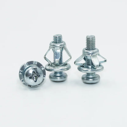 Three GripNut anchors on a white background, two with their steel petals folded open after setting