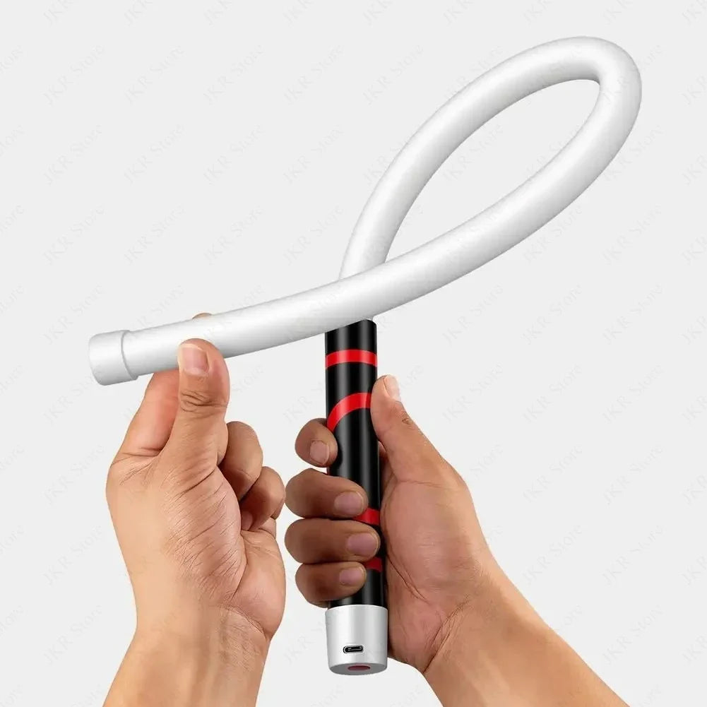 Two hands bending the FlexBeam body, USB-C port visible on the end cap